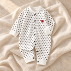 The Printed Cotton Baby Romper — black on ivory linen