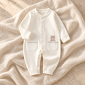 The Printed Cotton Baby Romper — WHITE on ivory linen