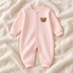 The Classic Button Knit Romper — pink on ivory linen