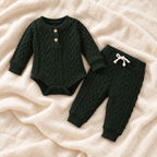 The Button Knit Top & Trouser Set — Style 01 studio flat lay on warm ivory linen