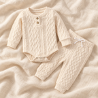 The Button Knit Top & Trouser Set — Style 04 studio flat lay on warm ivory linen