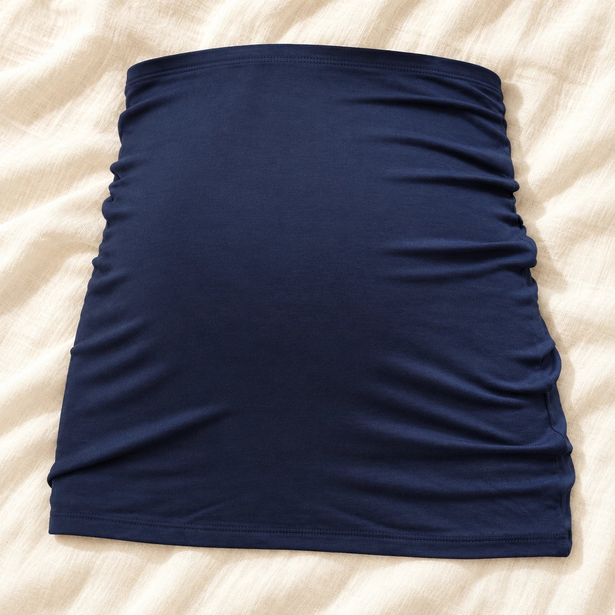 Tots & Moms stretch maternity band — navy / China Mainland / M — product on cream linen