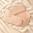 Adjustable Maternity Belly Band, Nude, product on cream linen