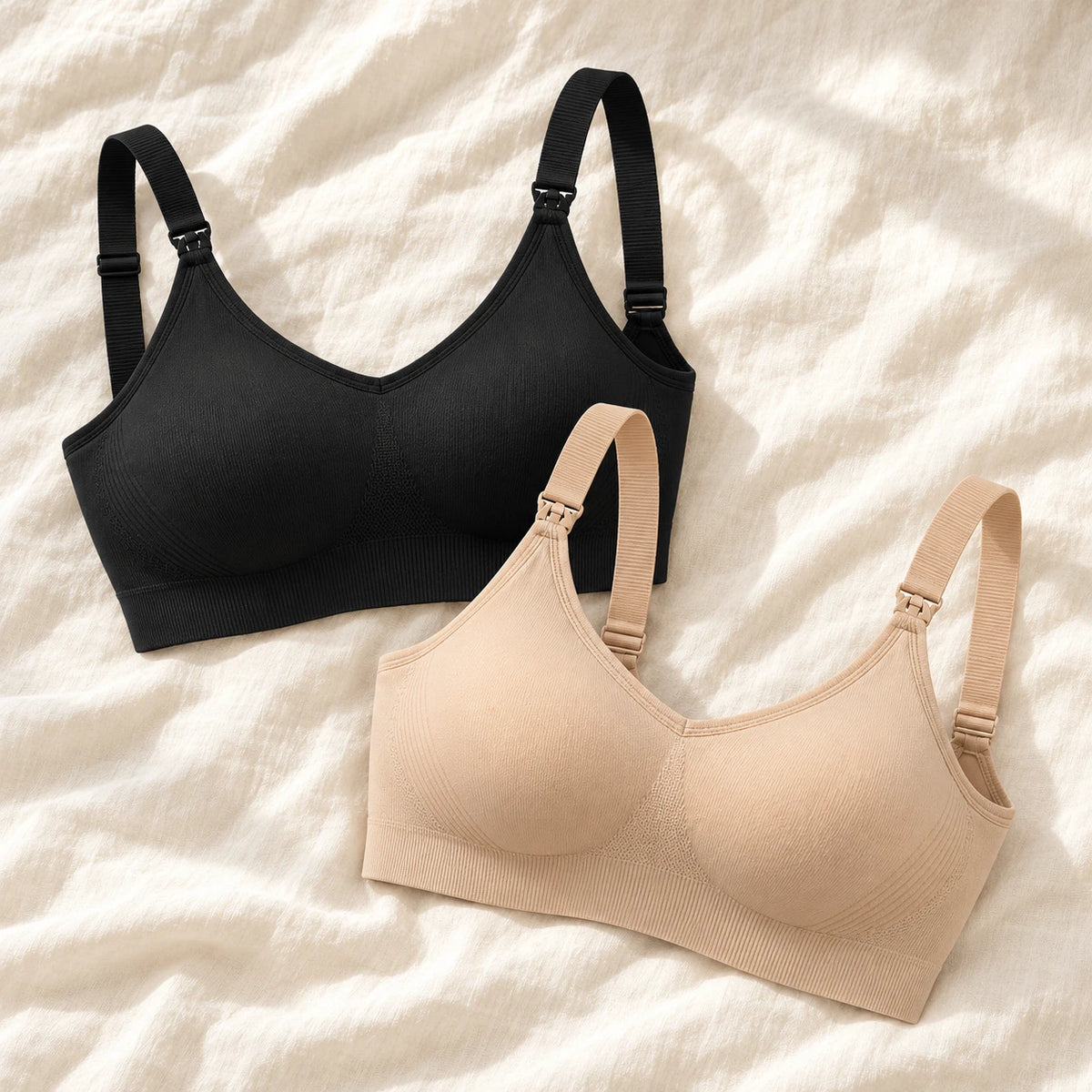 Wireless Clip-Down Nursing Bra — Single & Two-Packs — 2 bras — Black + Beige, photographed on cream linen