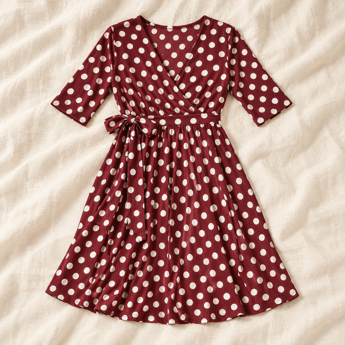 Tots & Moms V-neck maternity dress — Burgundy polka dot — product photograph