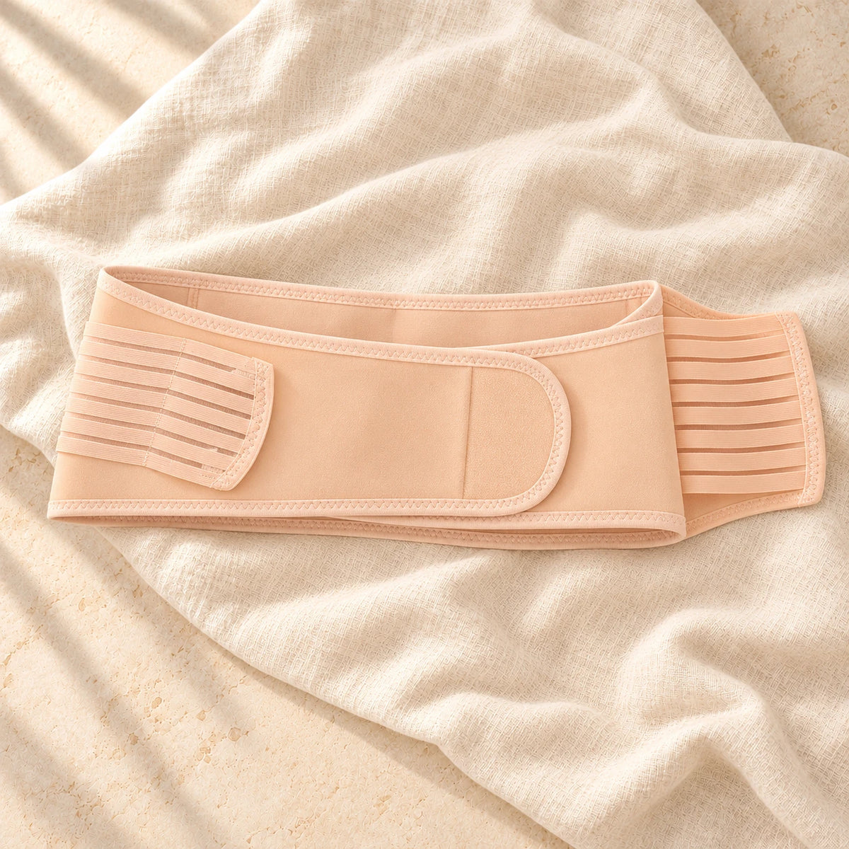 Maternity Waist Support Band — Beige, photographed on cream linen