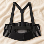 black multi-part pregnancy support belt with two adjustable shoulder straps, wide striped elastic lumbar panel, broad curved under-bump front support and narrow separate upper-bump support strap, product on cream linen