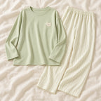 Long-Sleeve Nursing Pyjamas with Built-In Support — A02-24185 — product set on cream linen