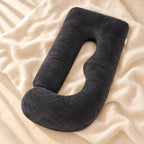 Tots & Moms U-shaped maternity pillow — Black, product on cream linen