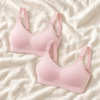 Wireless Clip-Down Nursing Bra — Single & Two-Packs — 2 bras — Pink, photographed on cream linen