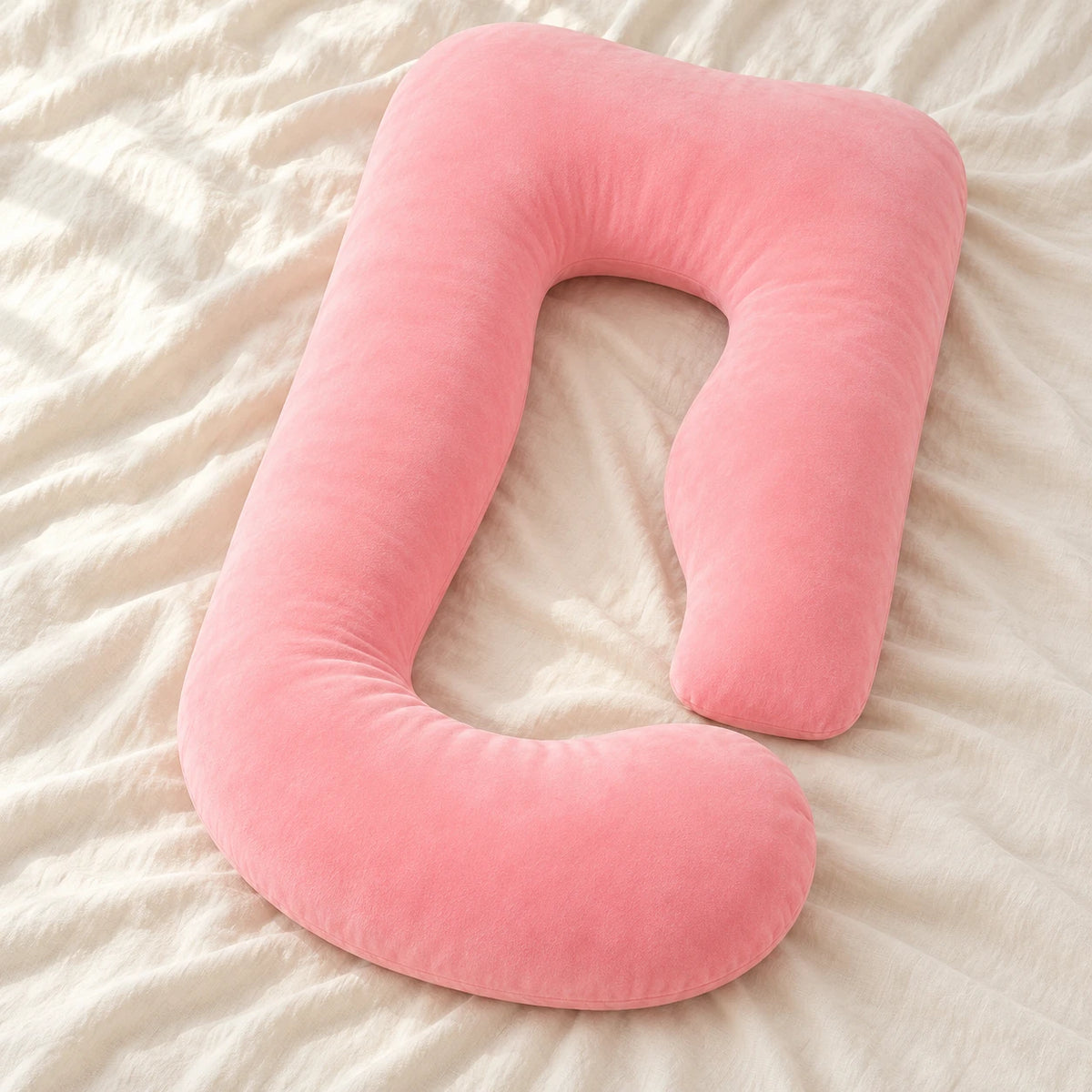 Full-Body Pregnancy Pillow with Washable Cover — Pink — product on cream linen