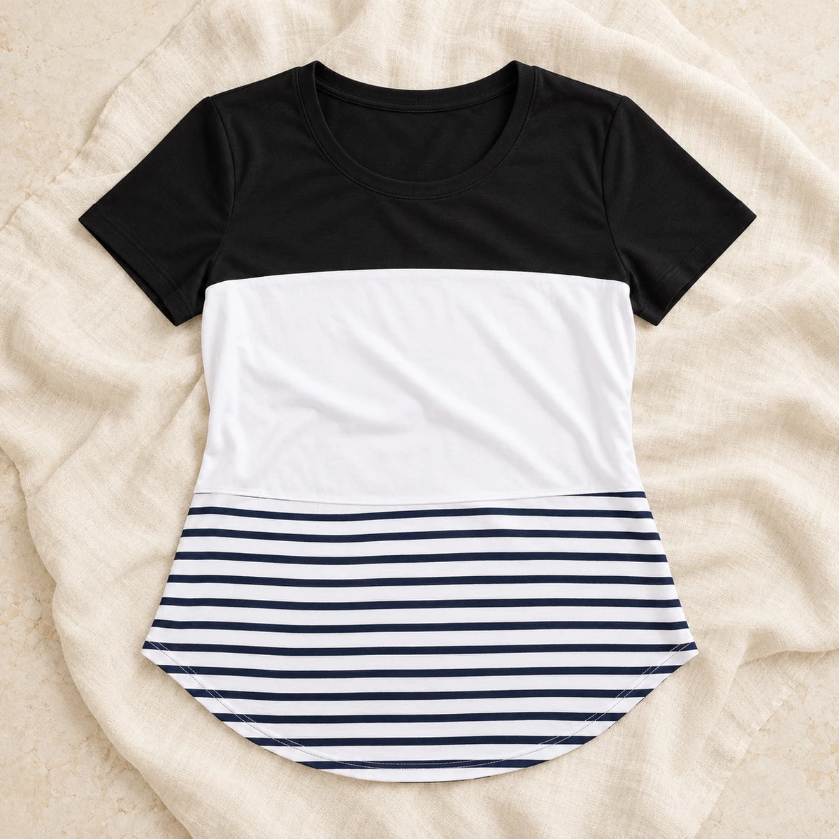 Relaxed Short-Sleeve Nursing T-Shirt — black, product on cream linen