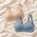 Wireless Clip-Down Nursing Bra — Single & Two-Packs — 2 bras — Beige + Blue, photographed on cream linen