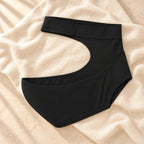 Adjustable Pregnancy Waist Support Belt, XL Black, product on cream linen