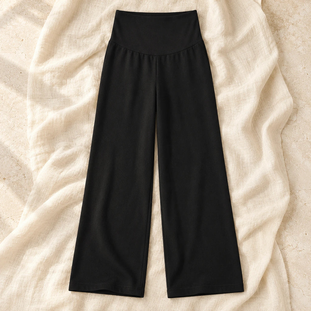 Relaxed Wide-Leg Maternity Trousers — Black, product on cream linen