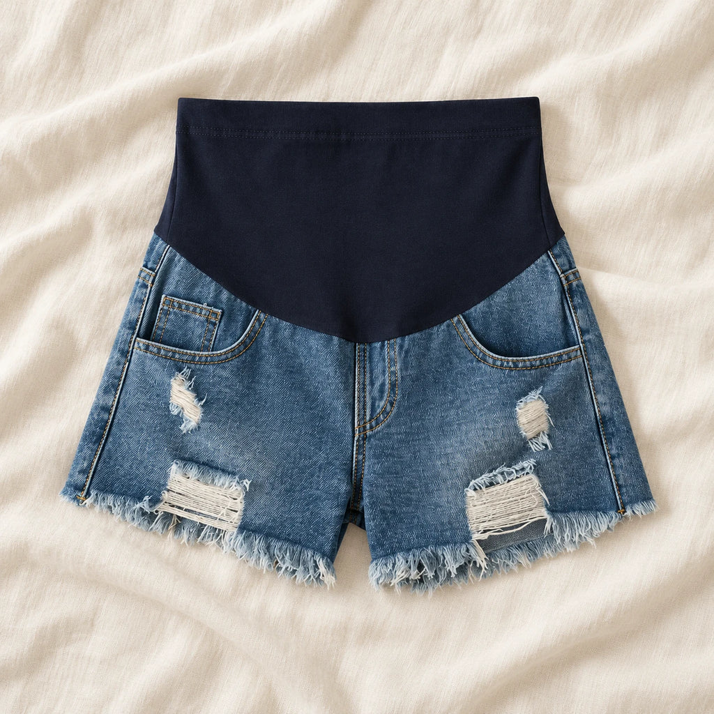 Distressed Maternity Denim Shorts — Style Dark Blue — full belly panel — on cream linen