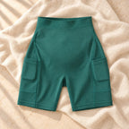 Over-Bump Maternity Biker Shorts with Pockets, green, on cream linen