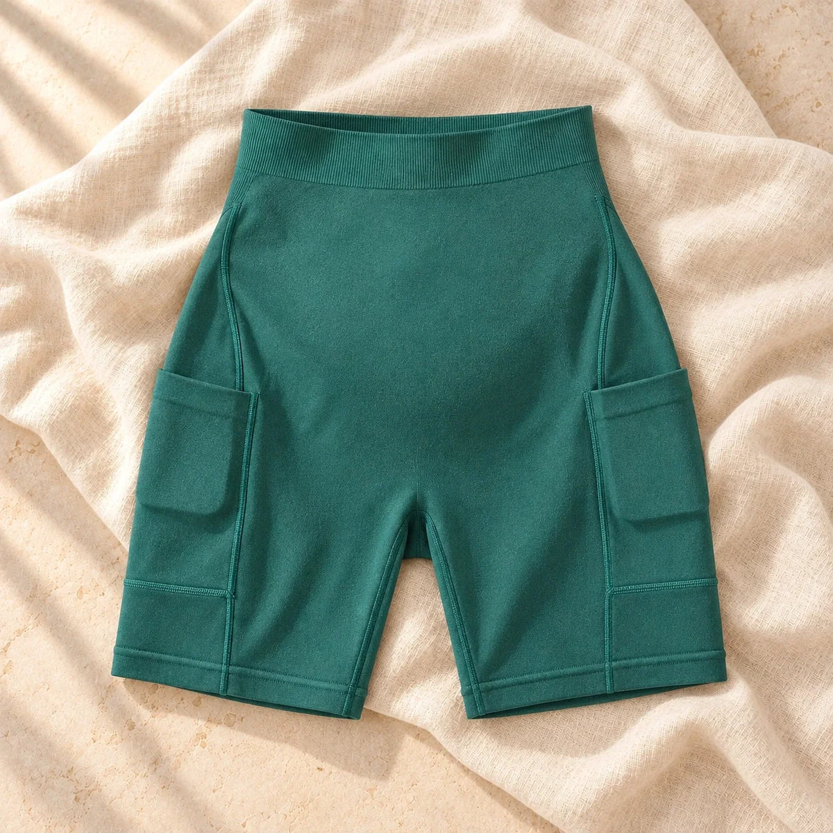 Over-Bump Maternity Biker Shorts with Pockets, green, on cream linen
