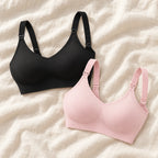 Wireless Clip-Down Nursing Bra — Single & Two-Packs — 2 bras — Black + Pink, photographed on cream linen