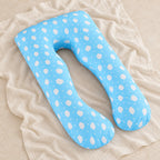 Full-body pregnancy pillow — Blue Cloud Print, product on cream linen