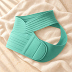 Adjustable Maternity Belly Band, Green, product on cream linen