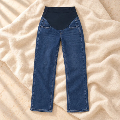 Adjustable-Waist Wide-Leg Maternity Jeans in Dark Blue, photographed on warm cream linen