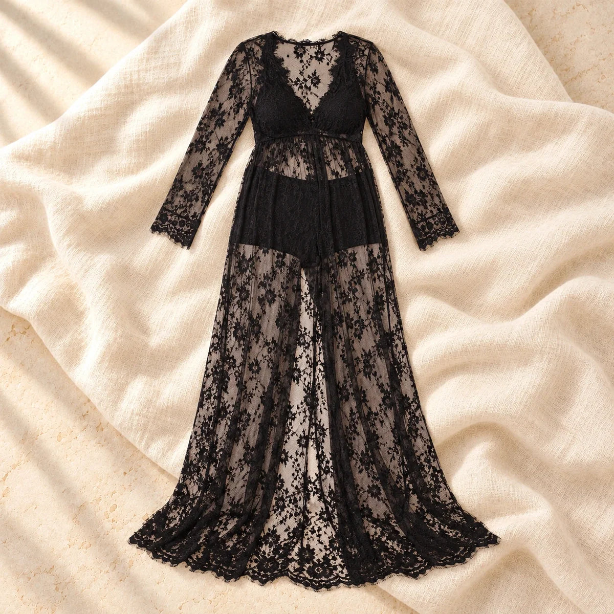 Lace Maxi Maternity Photoshoot Dress — Black, photographed on cream linen