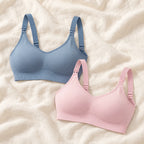 Wireless Clip-Down Nursing Bra — Single & Two-Packs — 2 bras — Pink + Blue, photographed on cream linen