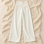 Relaxed Wide-Leg Maternity Trousers — White — Spring, product on cream linen