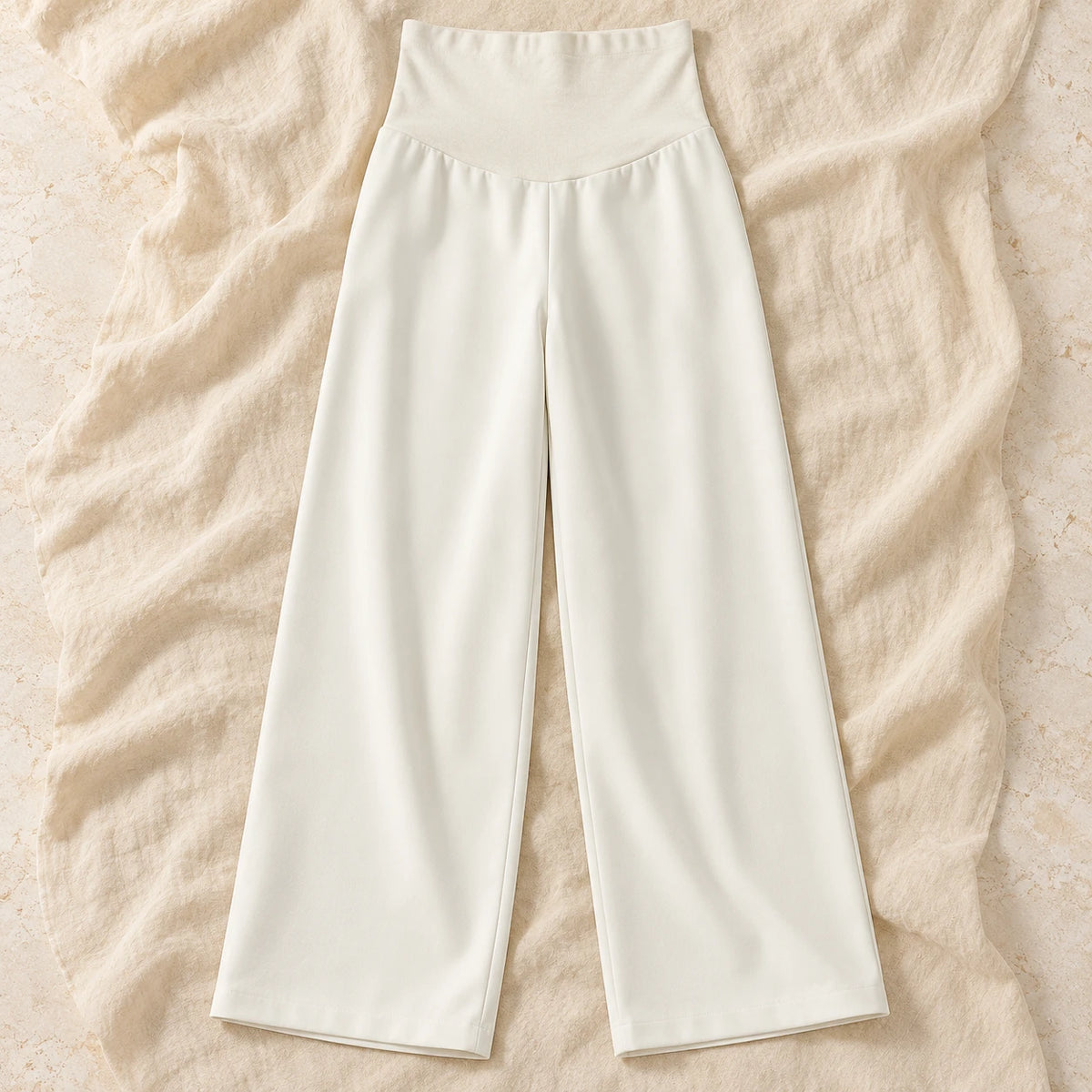 Relaxed Wide-Leg Maternity Trousers — White — Spring, product on cream linen