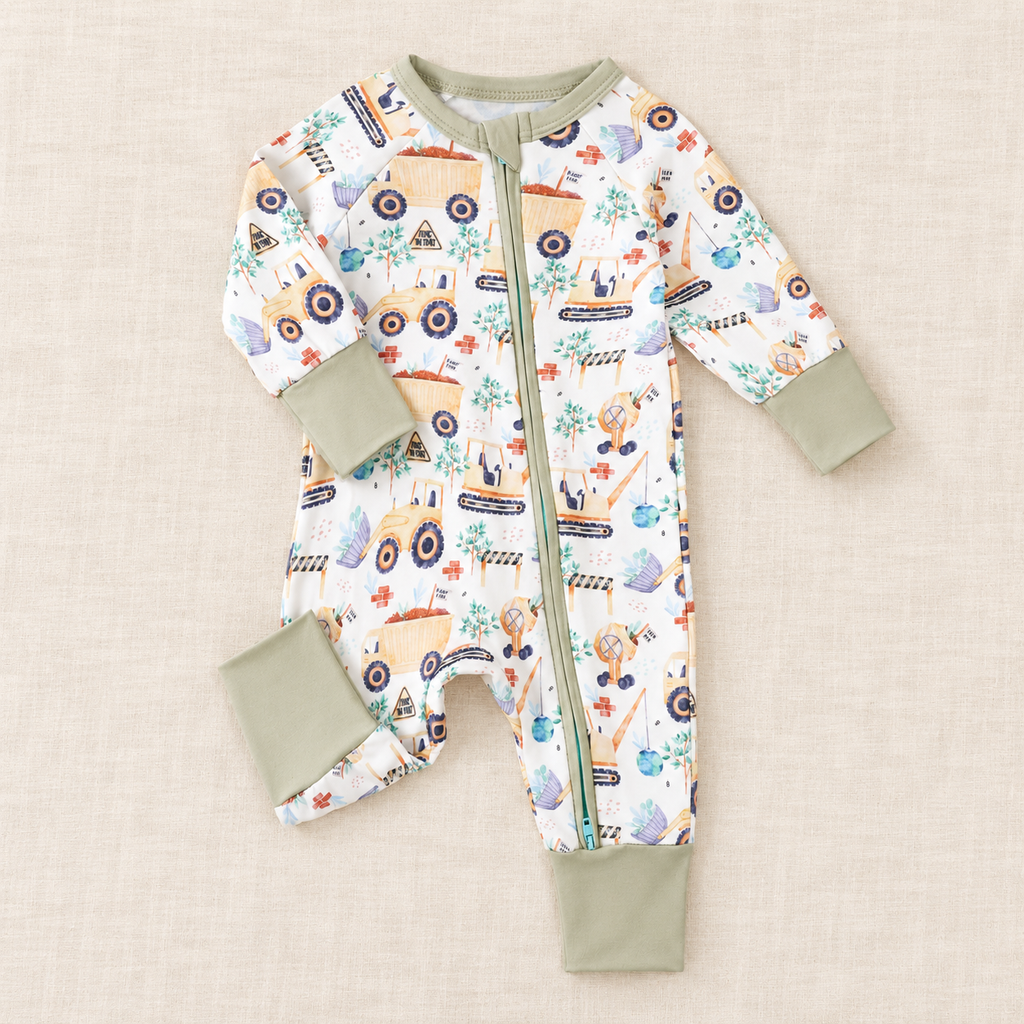 The Little Prints Baby Outfit Edit — Construction baby outfit in boutique studio photograph