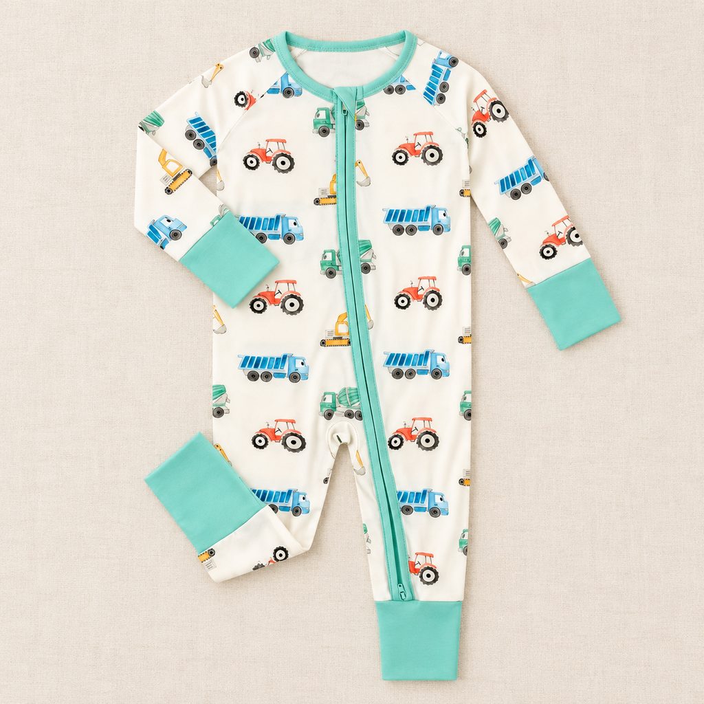 The Little Prints Baby Outfit Edit — Mint Trucks baby outfit in boutique studio photograph