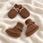 Cocoa brown knitted baby booties and mittens, Style 01, on ivory linen