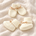 Bow knit baby booties and mittens set, Style 05, boutique studio photograph
