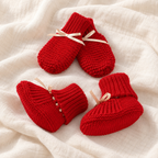 Bow knit baby booties and mittens set, Style 06, boutique studio photograph