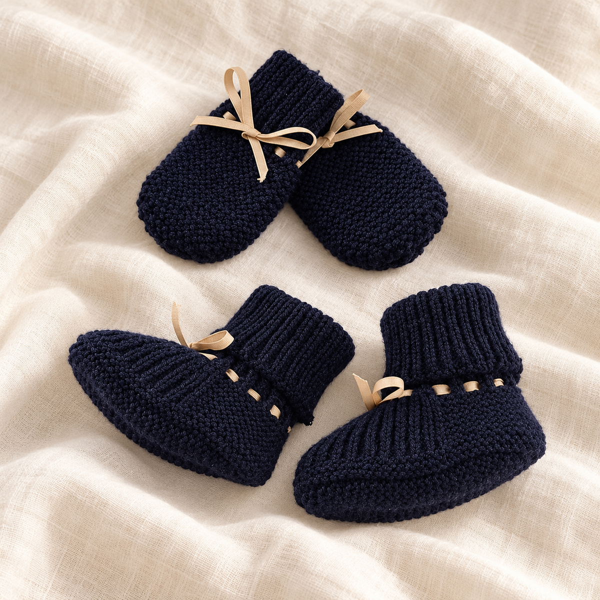 Bow knit baby booties and mittens set, Style 07, boutique studio photograph
