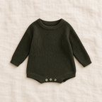 Button knit baby romper in army green, boutique studio photograph