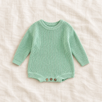 Button knit baby romper in Light Green, boutique studio photograph
