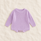 Button knit baby romper in PURPLE, boutique studio photograph