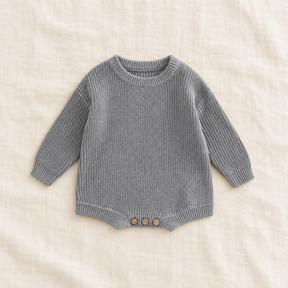 Button knit baby romper in GRAY, boutique studio photograph