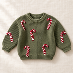 The Candy Cane Knit Sweater on ivory linen