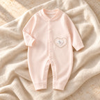 The Printed Cotton Baby Romper — Pink Elephant — studio product photograph