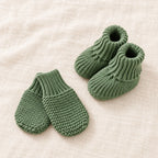 The Newborn Knit Wardrobe — Forest · Booties & Mittens — studio product photograph