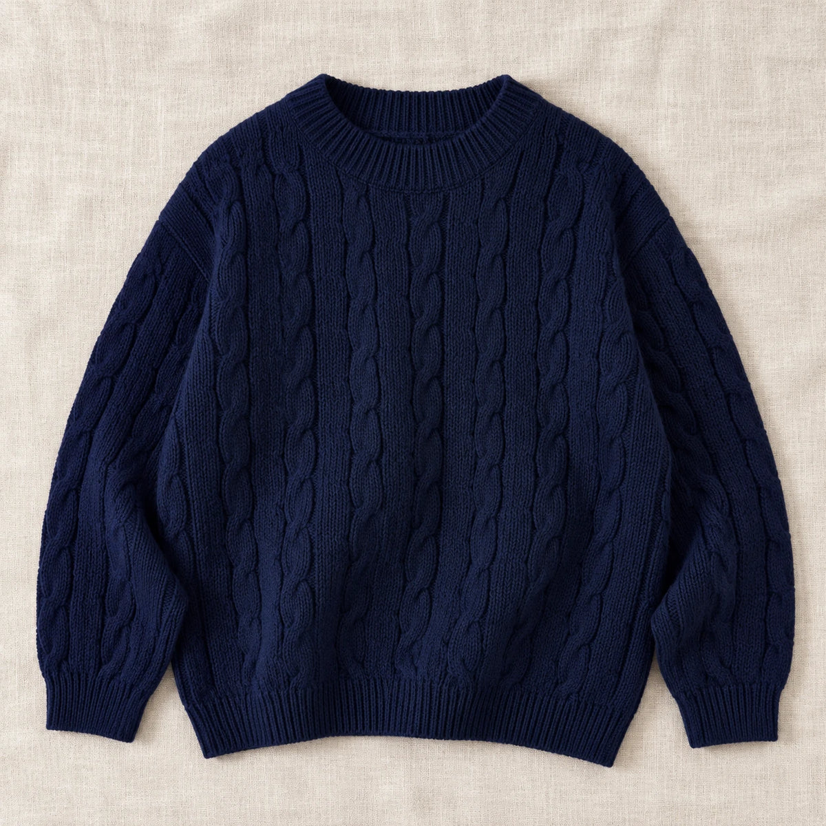The Classic Cable Knit Sweater — Navy — studio product photograph