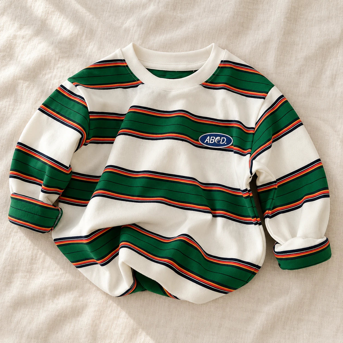 The Color Stripe Long-Sleeve Top — White — studio product photograph