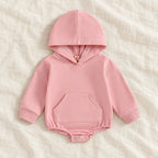 The Pocket Hooded Baby Romper — Pink — studio product photograph
