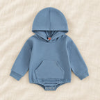 The Pocket Hooded Baby Romper — Blue — studio product photograph