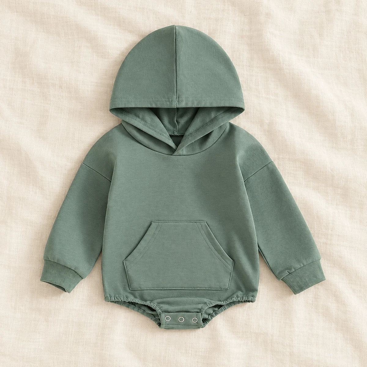 The Pocket Hooded Baby Romper — Green — studio product photograph