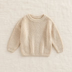 The Everyday Ribbed Knit Pullover — Beige — studio product photograph