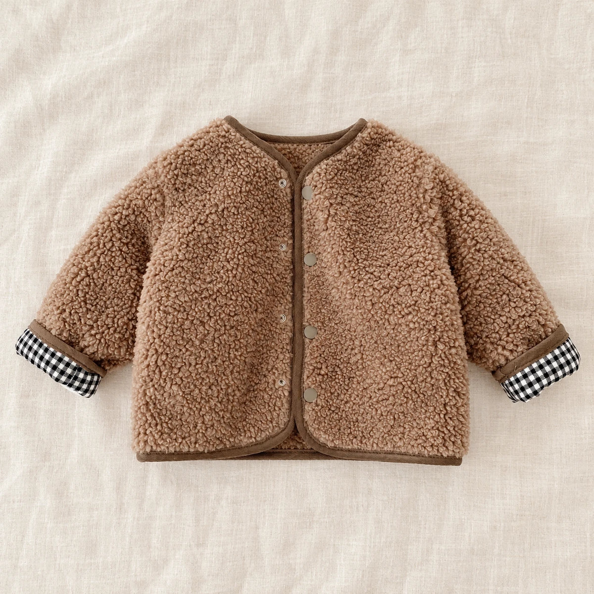 The Reversible Plaid & Teddy Jacket — Khaki — studio product photograph
